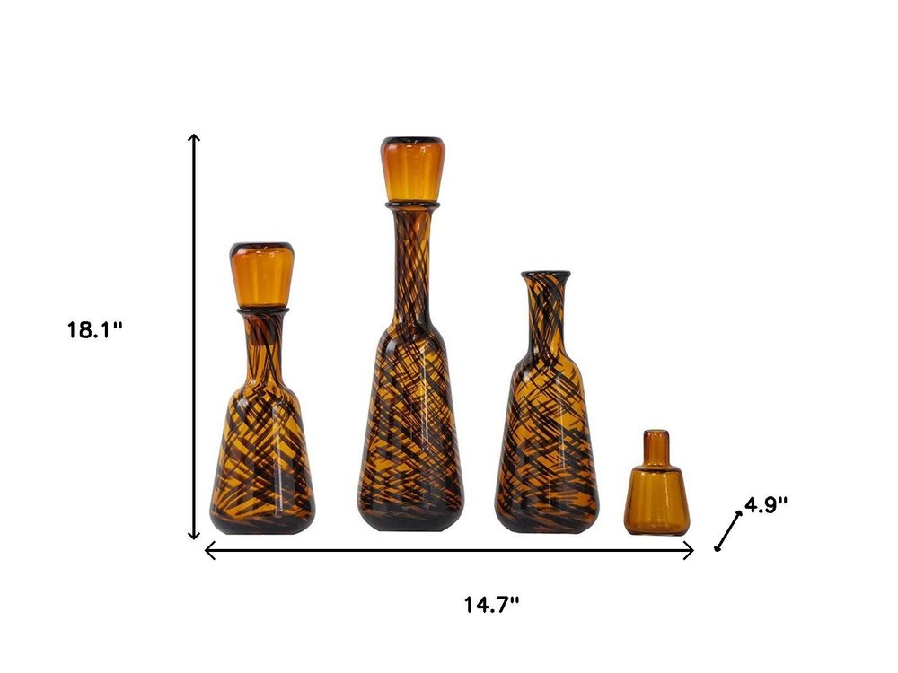 Set of Three Amber Abstract Swirl Glass Decorative Bottles With Stoppers