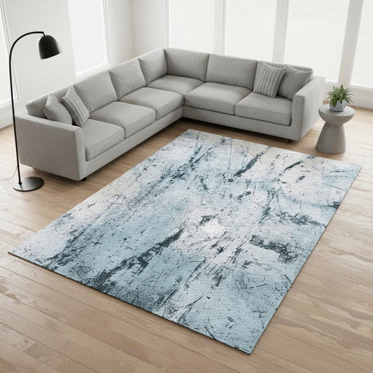 9' X 13' White And Blue Abstract Washable Area Rug With UV Protection