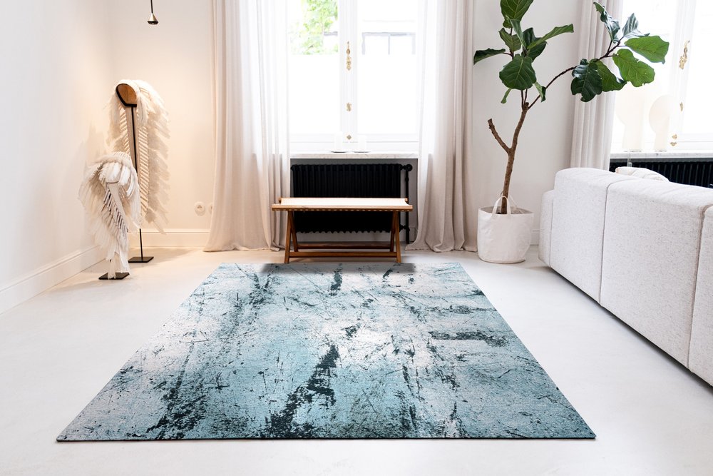 9' X 13' White And Blue Abstract Washable Area Rug With UV Protection