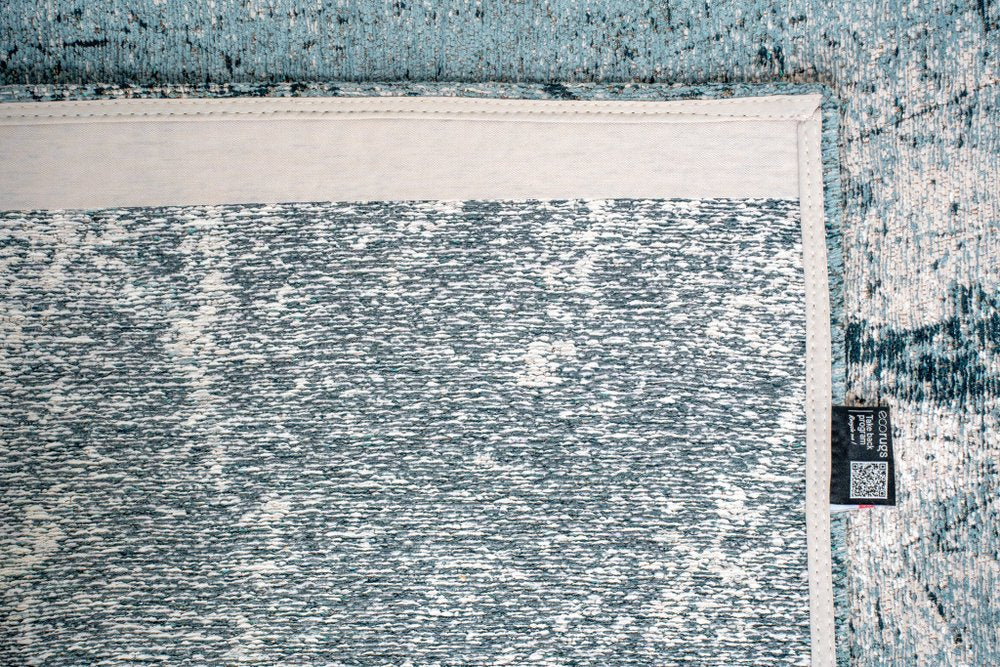 9' X 13' White And Blue Abstract Washable Area Rug With UV Protection