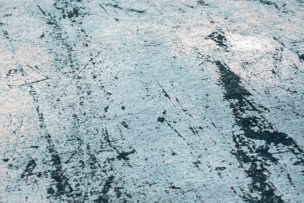 9' X 13' White And Blue Abstract Washable Area Rug With UV Protection