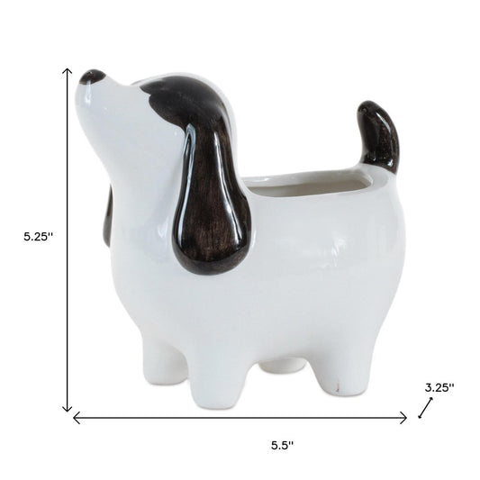 Set of Four Black And White Polyresin Dog Planters