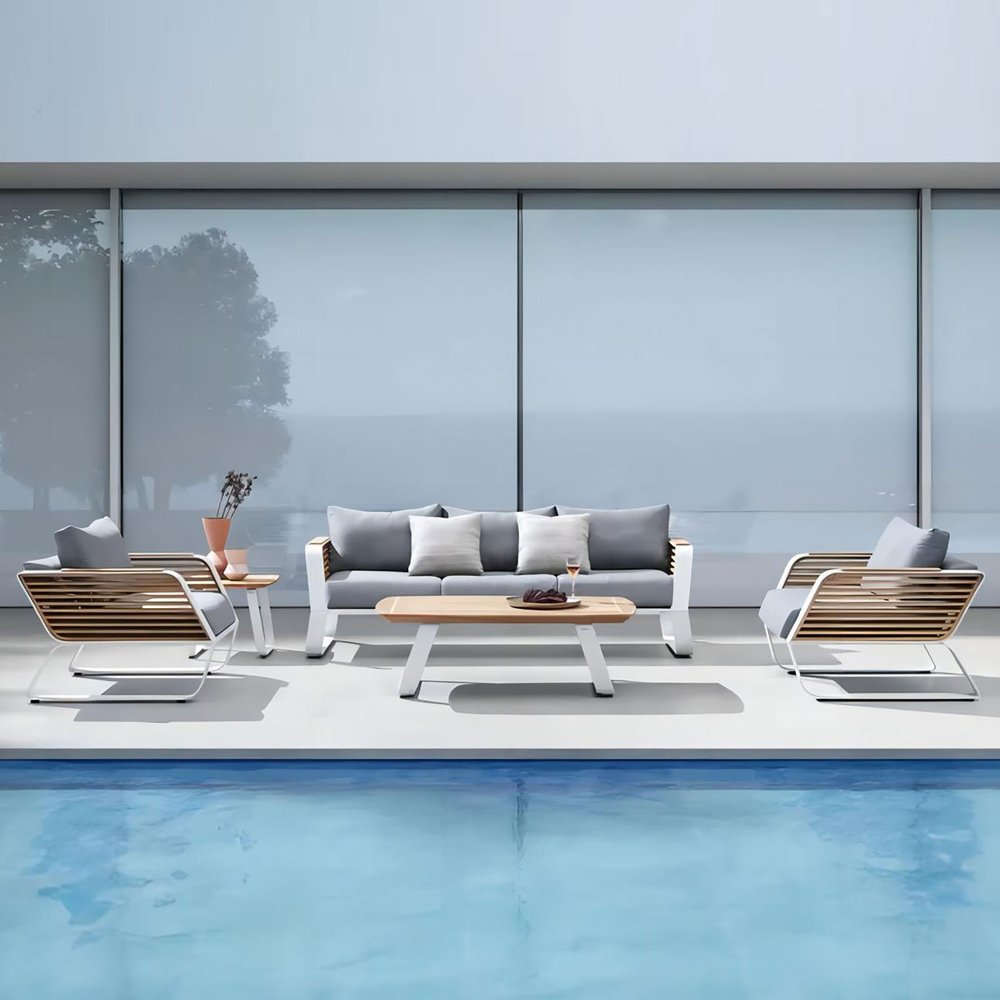 Four Piece White Metal Outdoor Patio Set With Table