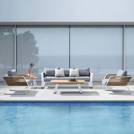 Four Piece White Metal Outdoor Patio Set With Table