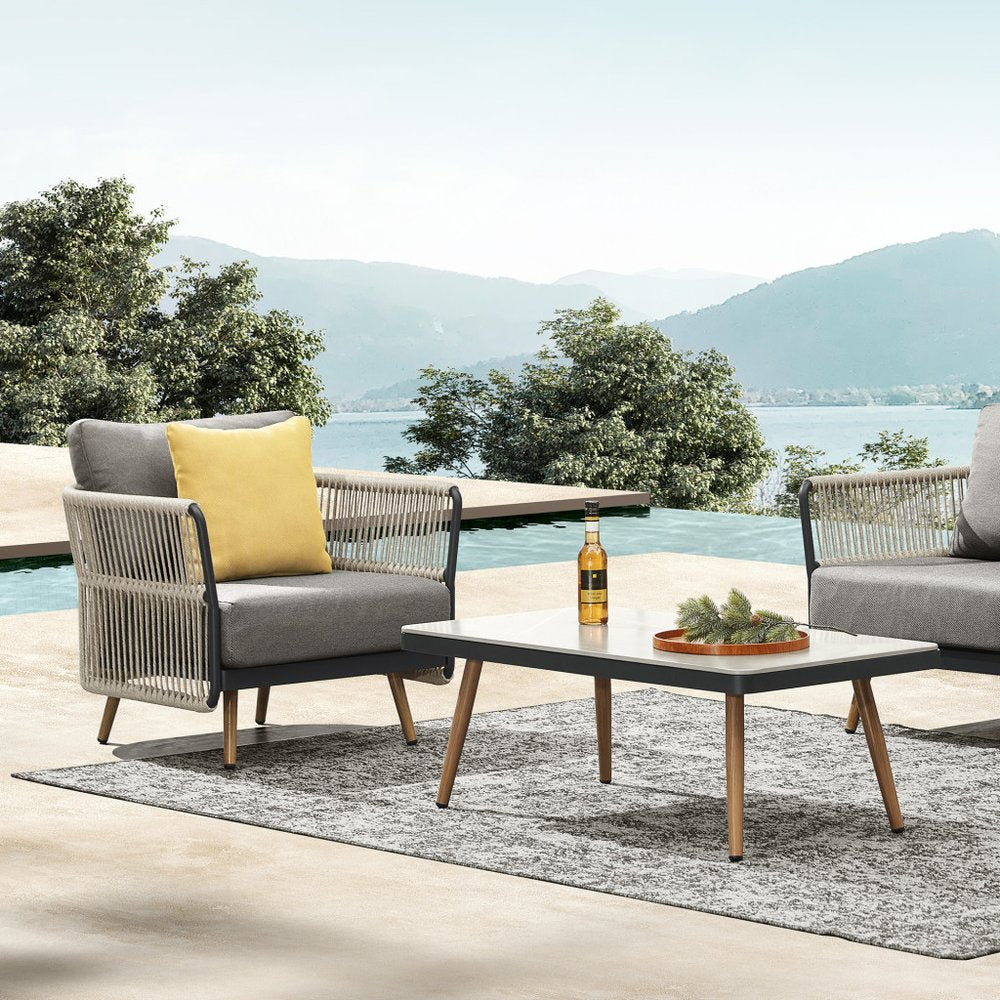 Four Piece Black Metal Outdoor Patio Set With Table