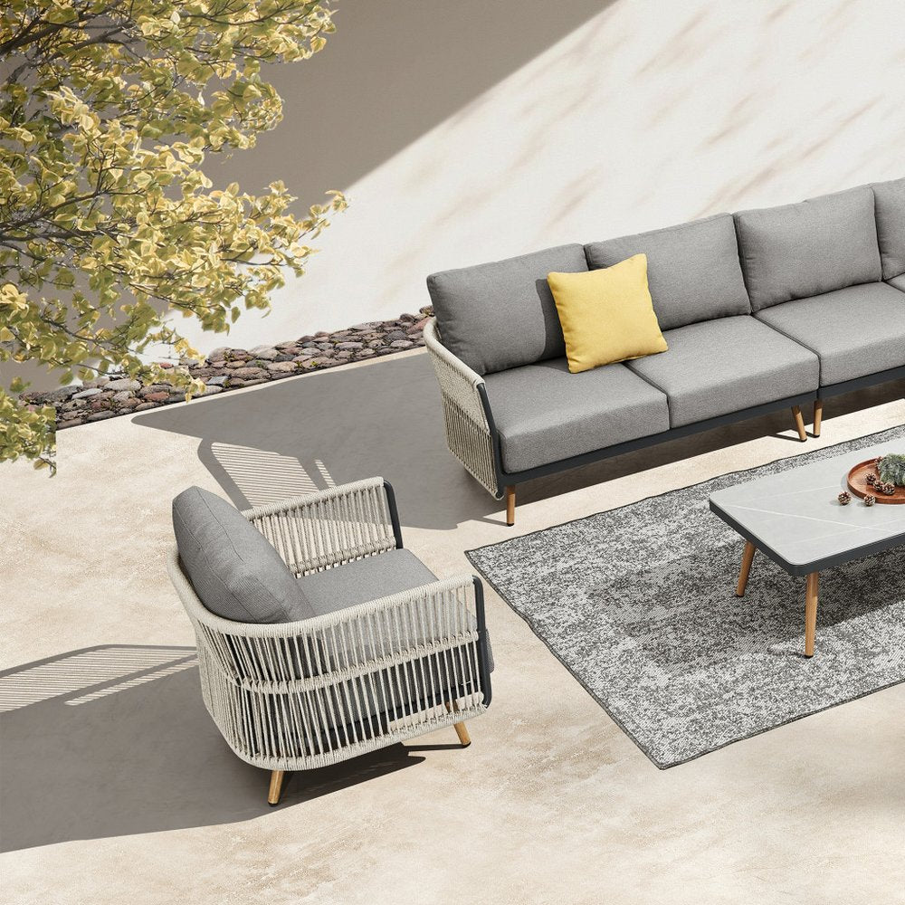 Four Piece Black Metal Outdoor Patio Set With Table