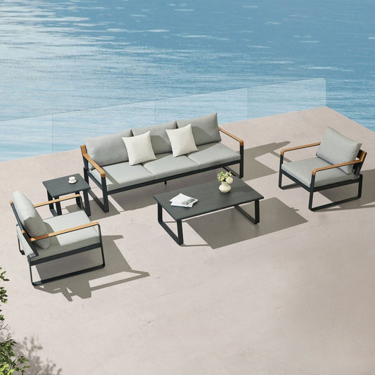 Four Piece Black Metal Outdoor Patio Set With Table