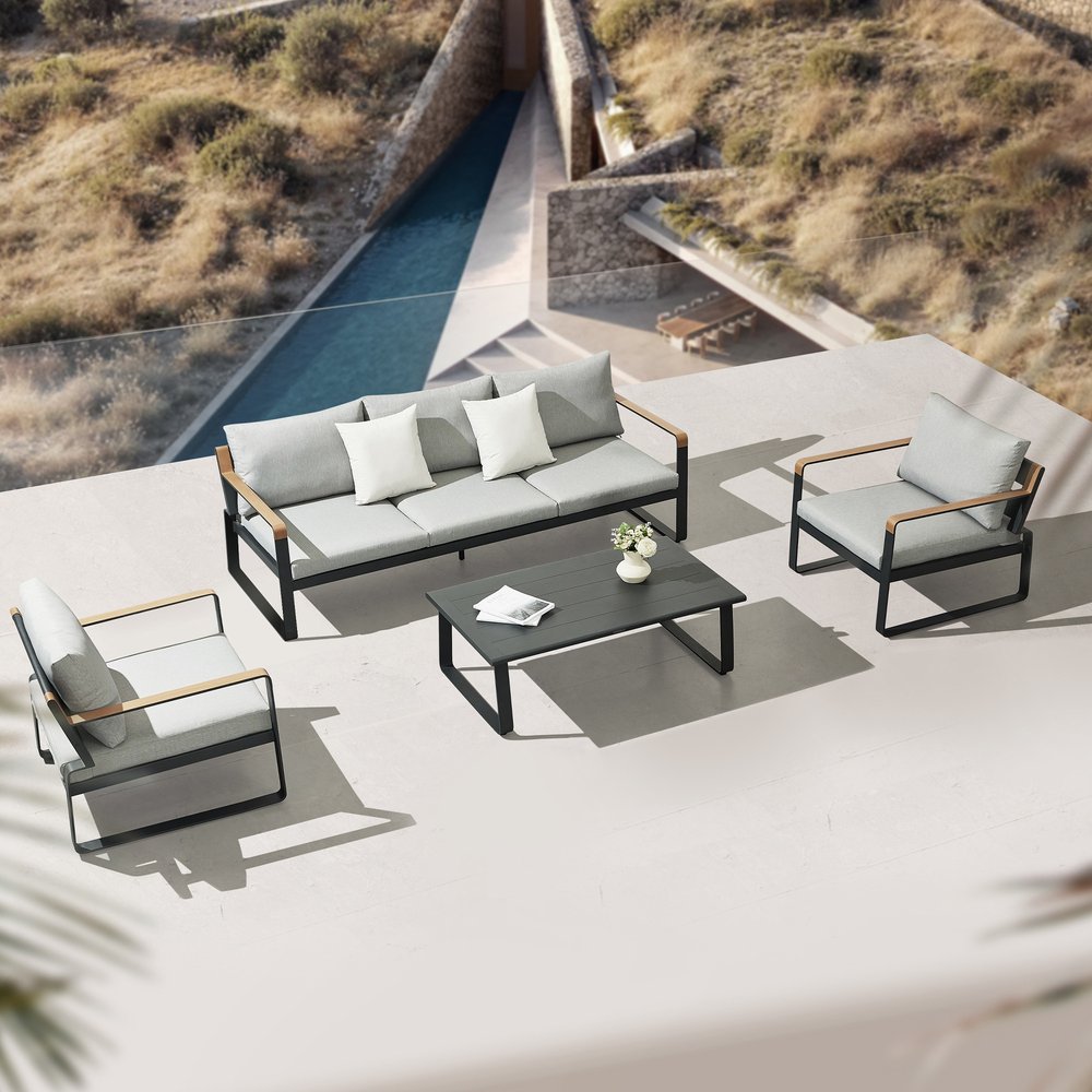 Four Piece Black Metal Outdoor Patio Set With Table
